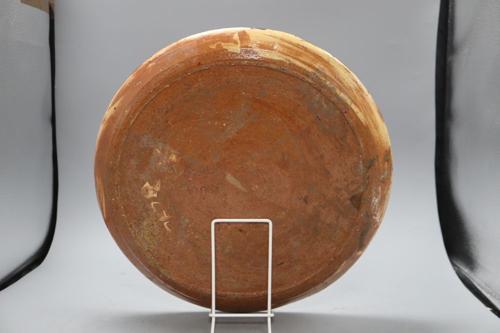 Peaquet Magen. A French faience dish, diameter 38cm